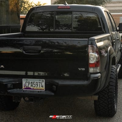17 inch Black Rhino Riot Beadlock Candy Red w/ Black Ring & Bolts on a Leveled 2013 Toyota Tacoma