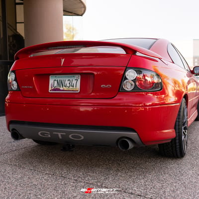 19 inch Avant Garde M520R Dark Graphite Metallic on a 2006 Pontiac GTO