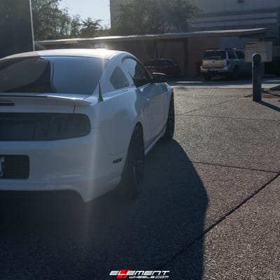 Staggered 19 Inch Niche Essen in Matte Black on a 2014 Ford Mustang