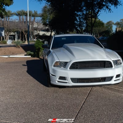 Staggered 19 Inch Niche Essen in Matte Black on a 2014 Ford Mustang