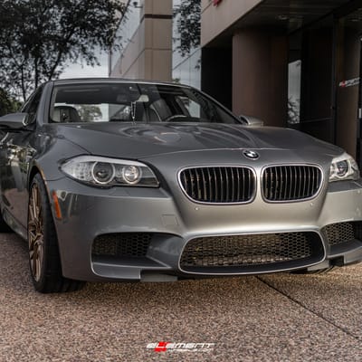 20 inch Staggered Rohana RFX10 Brushed Bronze on a 2013 BMW M5