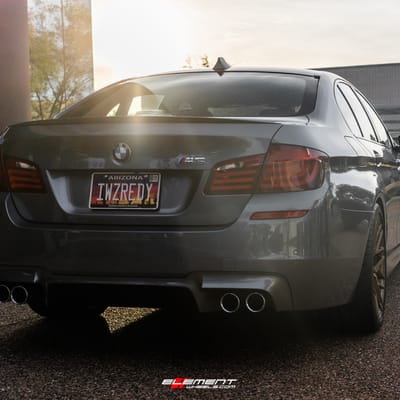 20 inch Staggered Rohana RFX10 Brushed Bronze on a 2013 BMW M5
