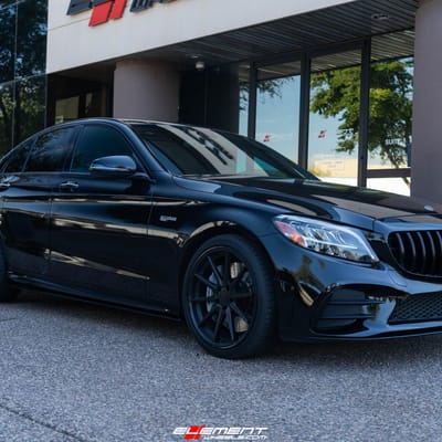Staggered 19 Inch Ferrada FR4 in Matte Black w/ Gloss Black Lip on a 2019 Merceded Benz C43 AMG