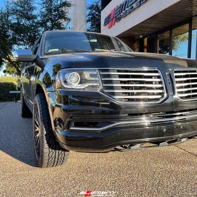 22 Inch Mazzi Twist Tie 373 Matte Black w/ Dark Tint on a 2016 Lincoln Navigator