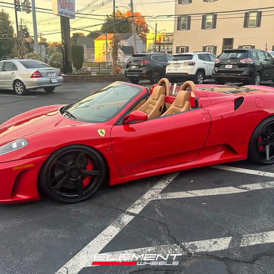 Staggered 20 inch Variant Sena in Gloss Black on a 2009 Ferrari F430