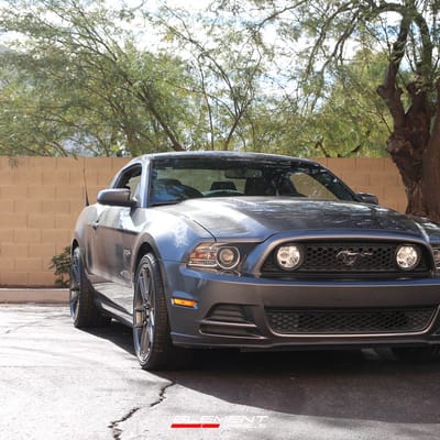20 inch Staggered Variant Helium Gloss Gunmetal on a 2014 Ford Mustang GT
