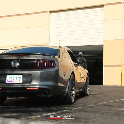 20 inch Staggered Variant Helium Gloss Gunmetal on a 2014 Ford Mustang GT