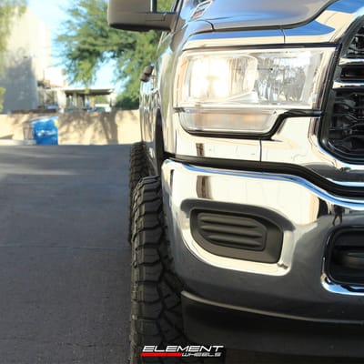 20 inch Fuel Off-Road Arc Silver Brushed w/ Milled Black Lip D798 on a Leveled 2022 Dodge Ram 2500