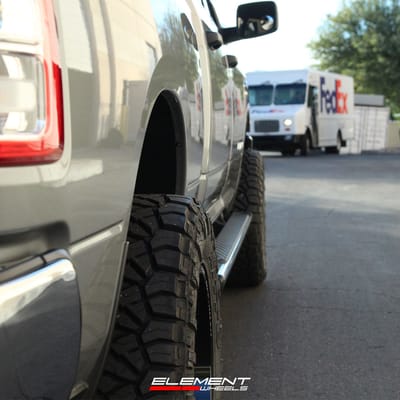 20 inch Fuel Off-Road Arc Silver Brushed w/ Milled Black Lip D798 on a Leveled 2022 Dodge Ram 2500