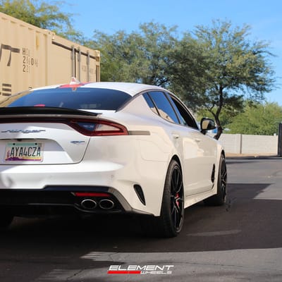 20 inch Staggered Performance Replicas PR193 Gloss Black Red Machined on a 2020 Kia Stinger GT
