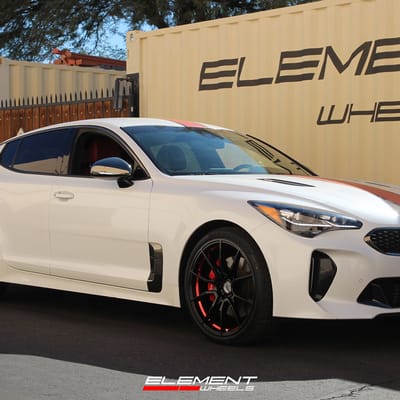 20 inch Staggered Performance Replicas PR193 Gloss Black Red Machined on a 2020 Kia Stinger GT