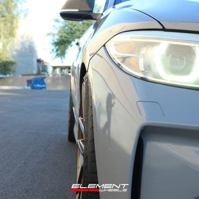 19 inch Staggered Offset Variant Helium Gloss Bronze on a 2015 BMW M235i