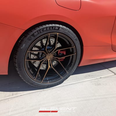 Staggered 20 Inch Stance Wheels SF03 Gloss Black with Polished Liquid Bronze Face on a 2020 BMW M8