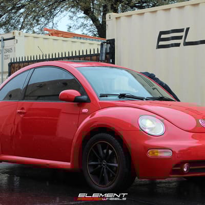 17 inch NS NS9012 Matte Black w/ Red Stripe on a 2002 Volkswagen Beetle Turbo