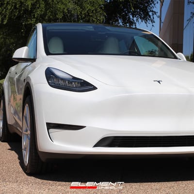 20 inch Staggered Variant Argon Silver Mirror Face on a 2023 Tesla Model Y Long Range AWD