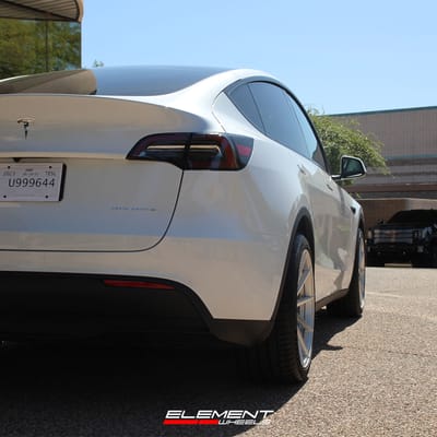 20 inch Staggered Variant Argon Silver Mirror Face on a 2023 Tesla Model Y Long Range AWD