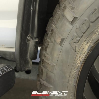 20 inch Fuel Off-Road Arc Silver Brushed w/ Milled Black Lip D798 on a Leveled 2022 Dodge Ram 2500