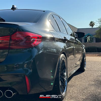 20 inch Staggered Ferrada CM2 Matte Graphite w/ Chrome Lip on a 2018 BMW M5