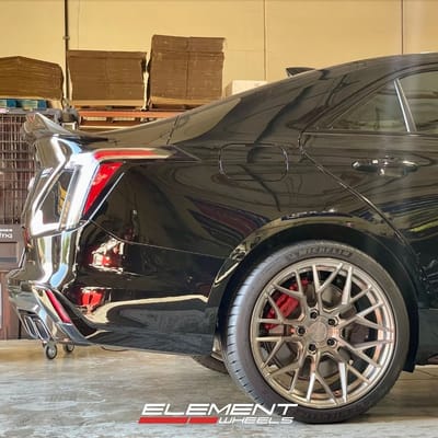 Staggered 19 inch Variant Radon in Titanium Brushed Face on a 2023 Cadillac CT4-V Blackwing