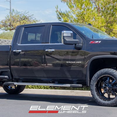 22 inch Moto Metal MO970 Gloss Black Milled Lip on a 2020 Chevrolet Silverado LTZ 3500