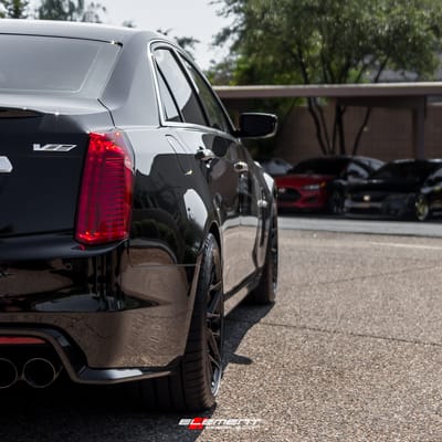 19 inch Staggered Variant Radon Gloss Piano Black on a 2016 Cadillac CTS-V Sedan