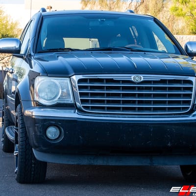 22 inch Diablo DNA Gloss Black w/ Chrome Inserts on 2008 Chrysler Aspen