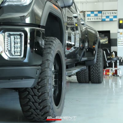 Staggered 22 Inch Cali Off-road Summit 9110 in Gloss Black w Milled Spokes on 2022 GMC Denali HD Dually