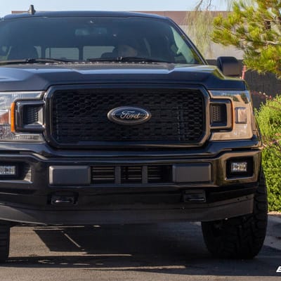20 Inch Fuel Off Road Ignite In Gloss Black W/Candy Red Accents on a 2020 Ford F-150