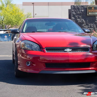18 Inch Motegi MR142 Satin Black W/ Red Stripe on a 2007 Chevrolet Monte Carlo SS