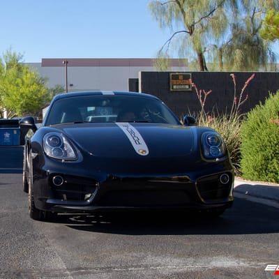 Staggered 20 Inch Avant Garde M520r in Matte Bronze on a 2014 Porsche Cayman