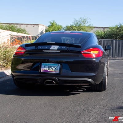 Staggered 20 Inch Avant Garde M520r in Matte Bronze on a 2014 Porsche Cayman