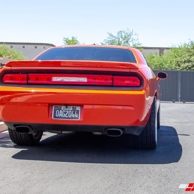 Staggered 20 Inch US Mag U111 Rambler Gray W Diamond Cut Lip on a 2013 Dodge Challenger