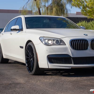 Staggered 22 Inch Savini BM16 in Gloss Black on a 2015 BMW 740LD X-Drive