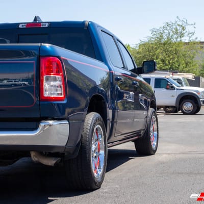 20 Inch Moto Metal MO993 in Chrome w/ Red Inserts on a 2019 Dodge Ram 1500