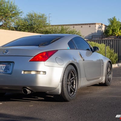 Staggered 18 Inch TSW Mechanica in Matte Gunmetal w/ Matte Black Face on a 2003 Nissan 350Z
