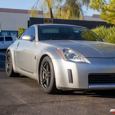 Staggered 18 Inch TSW Mechanica in Matte Gunmetal w/ Matte Black Face on a 2003 Nissan 350Z