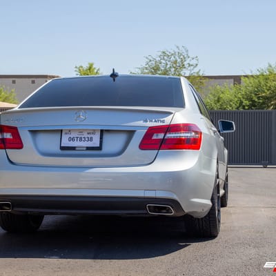 Staggered 20 Inch Ferrada FR4 in Matte Black w/ Gloss Black Lip on a 2013 Mercedes Benz E350