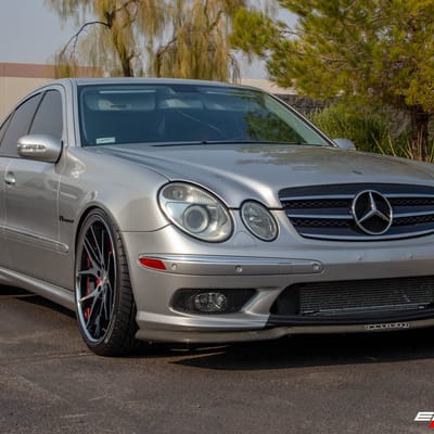Staggered 20 Inch Ferrada FR2 Machine Black w/ Chrome Lip on a 2005 Mercedes Benz E55 AMG