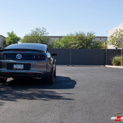 Staggered 18 Inch F1R F103 in Candy Red on a 2011 Ford Mustang Base