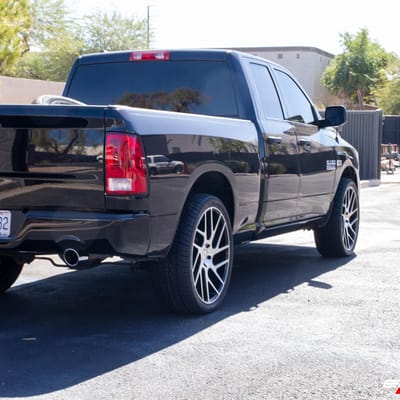 24 Inch Status Juggernaut in Gloss Black Machined on a 2015 Dodge Ram 1500
