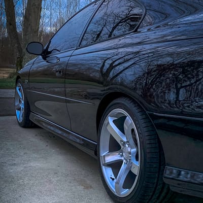 18 Inch Staggered MRR VP5 Gloss Silver Machined on a 2004 Pontiac GTO