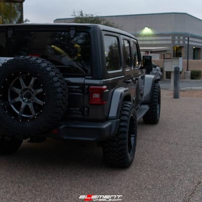 20 Inch Moto Metal MO970 in Gloss Gray w/ Gloss Black Lip on a 2019 Jeep Wrangler JL