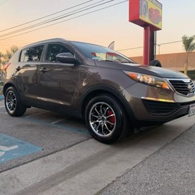 NS NS1403 Gloss Black Machined on a Kia Sportage