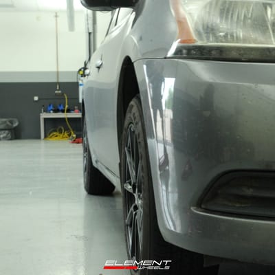 16 Inch NS NS1805 in Matte Black on 2015 Nissan Sentra