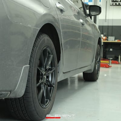 16 Inch NS NS1805 in Matte Black on 2015 Nissan Sentra
