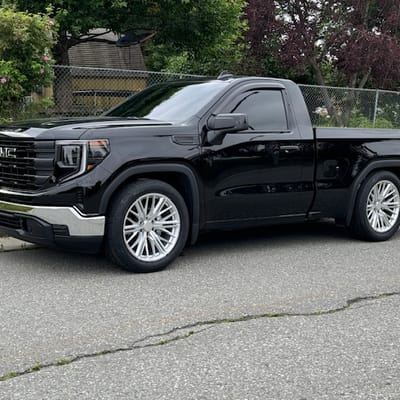 22in OE Concept Replica ZL1 Gloss Silver Machined On A Lowered 2023 GMC Sierra 1500