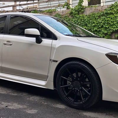 18x9.5 F1R F101 Gloss Black on a Subaru WRX
