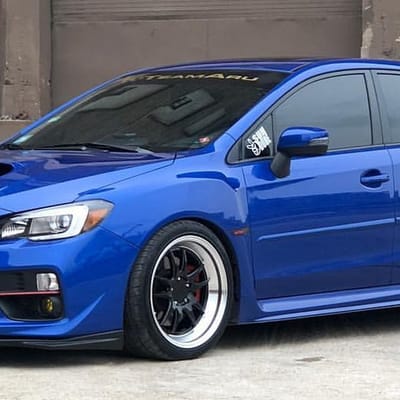 F1R F102 Gloss Black  w/ Polished Lip on a Subaru WRX