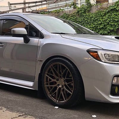 18x9.5 F1R F103 Brushed Bronze on a Subaru WRX