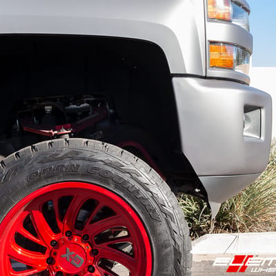 22 Inch XD Surge Lollipop Red (custom) on 2016 Chevrolet Silverado 2500 Lifted